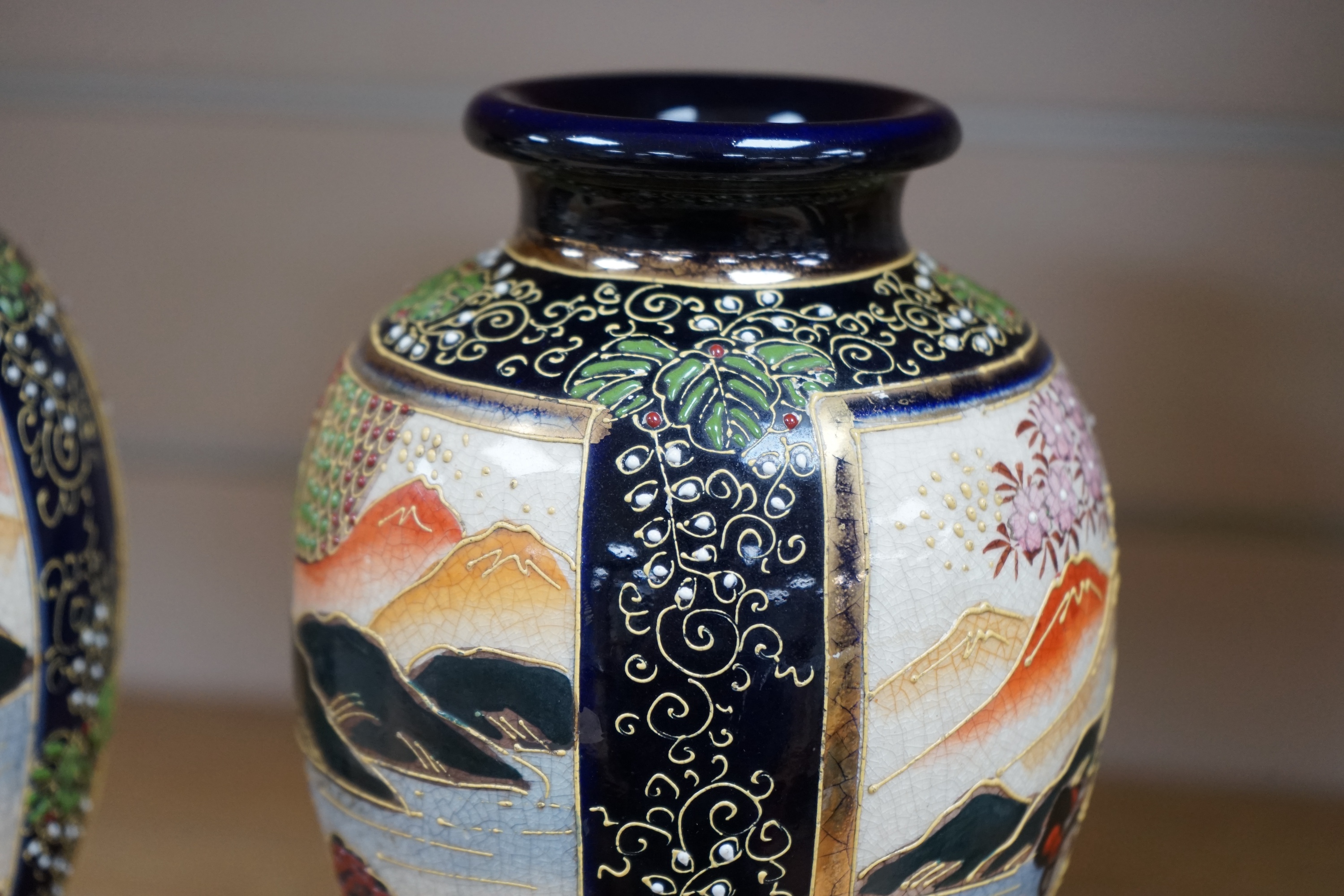 A pair of Japanese Satsuma vases, 22.5cm. Condition - good